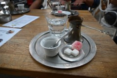 We stopped for a coffee while walking around the center of Sarajevo. The red is a soft piece of candy, home made, delicious to go with the coffee. 