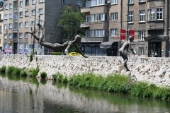 Enes Sivac made these sculptures in 1993, during the Siege of Sarajevo, and installed them in the same place over the Miljacka River near the Sarajevo Academy of fine Arts.  Photos of this work of art spread around the world and appeared on the pages of major newspapers and other medias as a powerful symbol of the cultural resistance to the aggression.