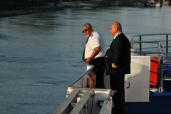 The Captain of the River Concerto tieing up the river boat at the docking facility in Ruse.