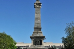 Liberty Square.  The monument depicts a female figure with a sword in her left hand while pointing with her right hand to the direction from which the liberators arrived. The lions are tearing off the chains of slavery and standing guard of Bulgaria’s liberty.