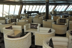 The Observation Lounge is perched high on deck 11 at the front of the cruise ship. It has panoramic views across the bow and during the day it is a peaceful place to relax and read a good book.  As the sun sets the Observation Lounge takes on a different mood. Guests gather in the sunset glow to share stories of their time ashore.