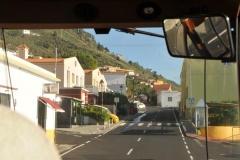 A local neighborhood on the highway to the top of the hills.  Walls of lava, which turn black when exposed to the air, have advanced slowly westward since Sunday, engulfing everything in their path, including houses, schools and some banana plantations.
