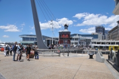 The Victoria & Albert Waterfront is an iconic mixed-use destination located in the oldest working harbor in the Southern Hemisphere.  With Table Mountain as its backdrop, the neighborhood sits within the beautiful city of Cape Town, welcoming millions of people from all over the continent and the rest of the world.  The swinging bridge is in the back ground of this photo.
