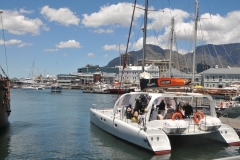 A charter leaving the dock area.