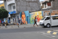 Another corner we find paintings of locals on buildings.