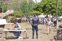 A policeman overlooking all that is taking place.