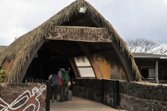 Entrance to the terminal from arriving planes. There is only one arrival daily from Santiago. Easter Island is one of the most remote inhabited islands in the world. The nearest inhabited land (around 50 residents) is Pitcairn Island 1,289 mi away. The nearest town with a population over 500 is Rikitea, on the island of Mangareva, 1,619 mi away. The nearest continental point lies in central Chile, 2,182 mi away.
