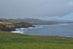 Easter Island shoreline.  Very little to no sand on beaches. Only rock shore cliffs.