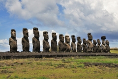 Ahu Tongariki is the largest ahu on Easter Island. Its moai were toppled during the island's civil wars and in the twentieth century the ahu was swept inland by a tsunami. It has since been restored and has fifteen moai including an 86 ton moai that was the heaviest ever erected on the island. Ahu Tongariki is one kilometer from Rano Raraku and Poike in the Hotu-iti area of Rapa Nui National Park. All the moai here face sunset during Summer Solstice.