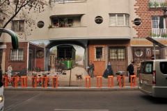 This is a building across the street from our hotel in Santiago that had two sides of the hotel painted into a giant mural around all the doors, windows and parts of the entire  building. They do this to eliminate the graffiti which there is a lot in Santiago.