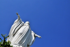 Looking skyward at La Virgen. Notice the new moon above the lower hand.
