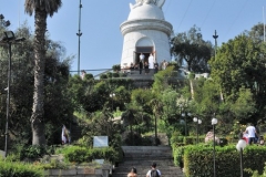 On its summit there is a sanctuary dedicated to the Immaculate Conception, with a 66 foot statue of the Blessed Virgin Mary, an amphitheater and a chapel. The statue of the Immaculate Conception measures 42 feet tall, and the pedestal on which it rests is 24.9 feet in height. Within the pedestal there is a small chapel in which Pope John Paul II prayed and blessed the city of Santiago on April 1, 1987. The statue is lit up at night by lights placed on its sides, allowing it to be viewed from all over Santiago both day and night.  At the foot of the statue there is an amphitheater for holding masses or other religious ceremonies. Near the statue, there is also a small chapel for praying.