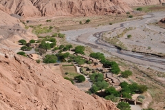 Looking down into the valley below after hiking to the top areas overlooking the landscape of the Atacama.
