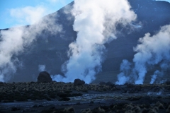 El Tatio is a geyser field located within the Andes Mountains of northern Chile at 14,000 feet above mean sea level. Various etymologies have been proposed for the system, including "oven" but also "grandfather". It is the third-largest geyser field in the world and the largest in the southern hemisphere.