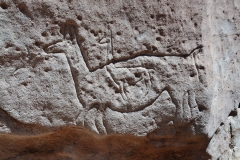 The petroglyphs were created by the Atacameno people and date back approximately 10,000 years.
