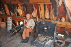 Replica of the Victoria, cook at the stove.