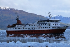 This is our home MS Skorpios III for three nights. M/V Skorpios III, which can hold 90 passengers. In 2003 Cruceros Skorpios extended its operations to the Magellanic region, opening a new tourist route, known as the Kaweskar Route, that takes us to the glaciers of the Southern Ice Fields, sailing from Puerto Natales to the Southern Ice Fields. M/V Skorpios III was transferred to Puerto Natales, where a terminal was built for it.