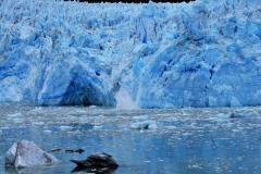 Calving, is the breaking of ice chunks from the edge of a glacier. It is a form of ice ablation or ice disruption and is normally caused by the glacier expanding.