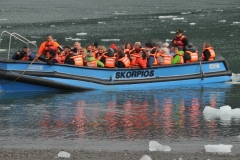 A group returning from the land back to the Skorpios.
