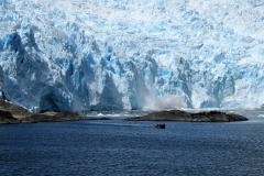 Now you can see the size of the calving in the distance with the small zodiacs in the foreground going back to the ship.