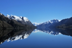 The White Lady, a 7,000 foot peak,  and the Cordillera Riesco is best known for Grupo  la Paz, a cluster of jagged rock towers.