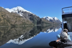 The water is so still as we pass in the fjord.  It is a photographers dream with the reflections upon the fjord.