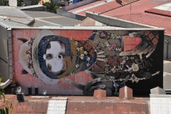 More graffiti on buildings.. painted sideways