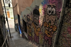 Going down a stairs to a main street