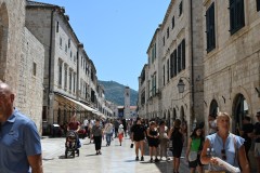 Stradun, whose name derives from Venetian, and means "large road" or "wide road", is the main street of Dubrovnik, Croatia.  A main street within the walls of the city to the southern part  and the harbor area in the distance.. The history of the city probably dates back to the 7th century, when the town known as Ragusa was founded by refugees from Epidaurum.