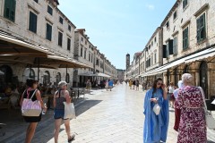 Stradun stretches through the walled town in the east–west direction, connecting the western entrance called the Pile Gate to the Ploce Gate  on the eastern end. Both ends are also marked with 15th-century fountains, the so-called Large Onofrio's Fountain in the western section and the Small Onofrio's Fountain on the east end and bell towers the Dubrovnik Bell Tower to the east end and the bell tower attached to the Franciscan monastery to the west.