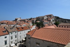 Looking over roof tops below to the southwest.  During the walk there are numerous times you walk up another 40 to 60 steps as the terrain below rises. 