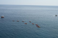 Looking out to the sea are a group of kayaker's enjoying the late afternoon on the water. 