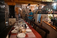 Our host is a real fun person and the dining room is set for us  and we are surrounded with family items.  We have an incredible meal and fun music and dancing too into the evening. 