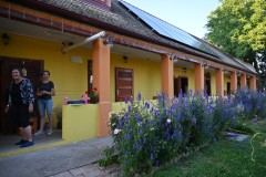 In the evening we walked a few hundred feet down the street to a home hosted dinner with a local family.  Both the husband and the wife are in law enforcement. He pilots a police boat on the Danube not far away for the police and she is a police person also. Here is the outside of the home they have restored.