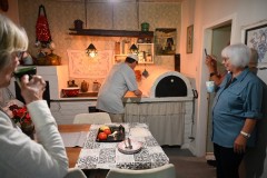 In the kitchen we take turns cracking eggs and helping prepare breakfast family style. 