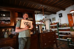 Dennis showing us a photo of his parents who started this family farm on this very site. 
