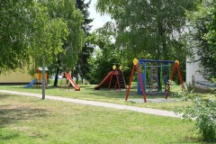 A park for children next to a church down the street
