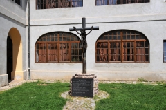 The inside courtyard of the Franciscan Church  - The Church of the Raising of the Holy Cross.   Jesus on the cross is a unique metal sculpture. The cross is made of artillery artifacts and worth the visit.