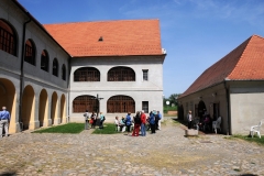Inner courtyard of the church where the cross of metal and the statues of the remembance of the holicost victims. .