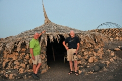 We were lead to believe we would be staying at a Red Sea Resort. This is home for the night. An Afar hut. Dirt floor, a cot, no sheets, no pillow, no blanket. Toilet off in the distance but no water, no toilet paper. Shower also in the distance no water, no towels, no soap . Surprisingly the food was good. Local dishes. A fellow traveler Bill is standing at the entrance with me.