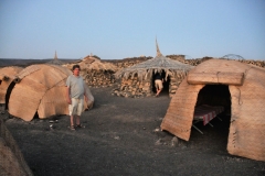 Fellow travelers and their huts. At least I had a hut built of stone and not skin covering the outside.