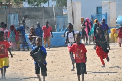 We were quite a sight for all the kids and they ran up to our vehicles.
