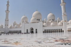 Inner courtyard with Minaret. The Mosque is the largest in the United Emirates.