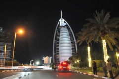 Burj Al Arab stands on an artificial island 920 feet from Jumeirah beach. It is connected to the mainland by a private curving bridge. Structure is designed to mimic the Sail of a Ship.