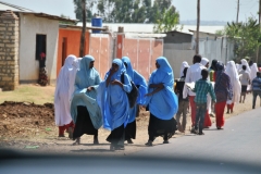 Young school girls walking to school