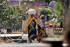 Local ladies going about their daily activities in town.