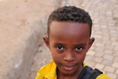 Handsome little guy that walked behind me for a while checking out the tourist. He smiled when I showed him his photo. Many kids I don't think have seen themselves in a mirror or photo.