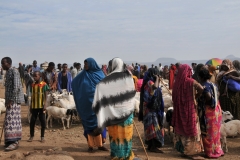 The beauty of the moment is seeing so many colorful garments warn by the women of the different tribes.