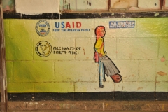 Another US Aid painted inside the school on a wall outside the classrooms.