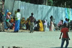 A group of ladies getting ready to celebrate a local holiday.